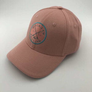 Pink baseball cap with a circular logo on the front.
