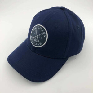 Navy blue baseball cap with a round clock design patch on the front.