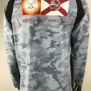 Long-sleeve camouflage shirt with graphic patches on the chest and shoulders.