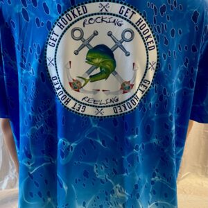 Close-up of a blue sports jersey with a circular logo featuring a turtle and anchors.