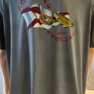 Person wearing a grey T-shirt with a colorful graphic and red text.